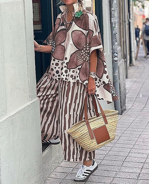 Damen Übergroßes Tunika-Set mit floralem Muster und gestreiften Hosen EB