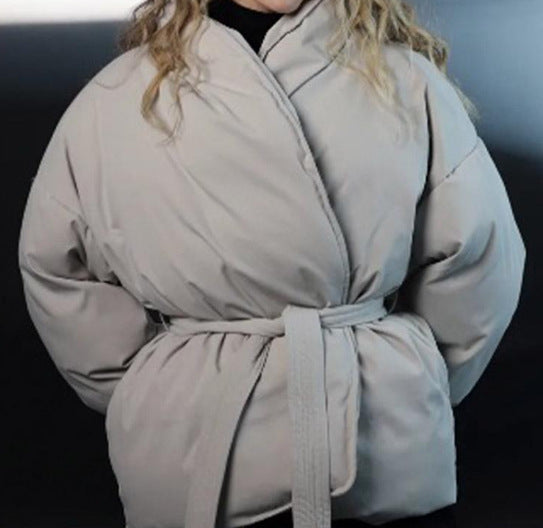 Damen Oversized Steppjacke mit Gürtel und hohem Kragen EB