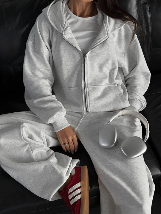 Damen lässiges Zip-Lounge-Set mit übergroßer Kapuzenjacke und taillierter Relax-Jogginghose Eichborn Berlin