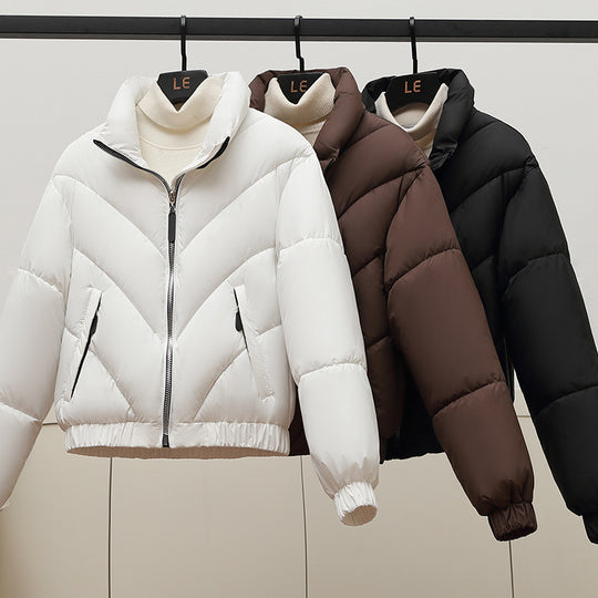 Damen Trendige und kuschelige Pufferjacke mit hohem Kragen und praktischen Eingrifftaschen EB