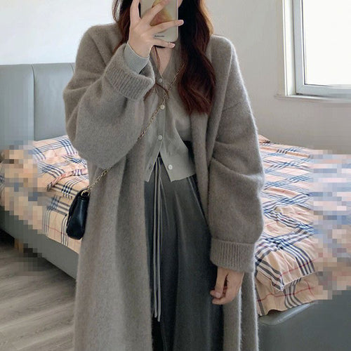 Damen Gemütliche Strickjacke mit oversized Schnitt und sanften Puffärmeln EB