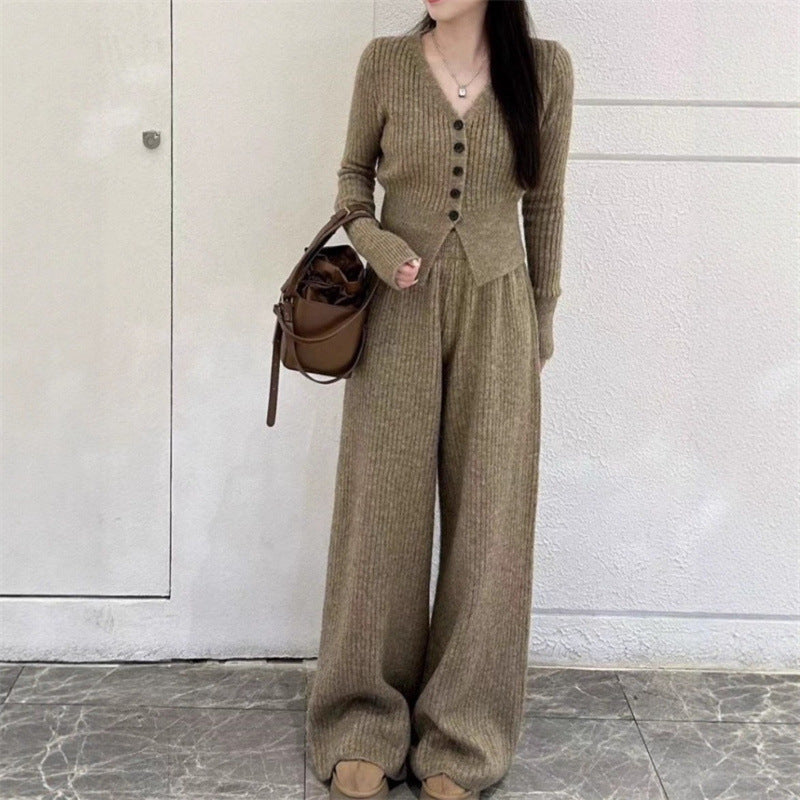 Damen Elegantes gestricktes Jumpsuit mit Knopfdetails und weitem Bein EB