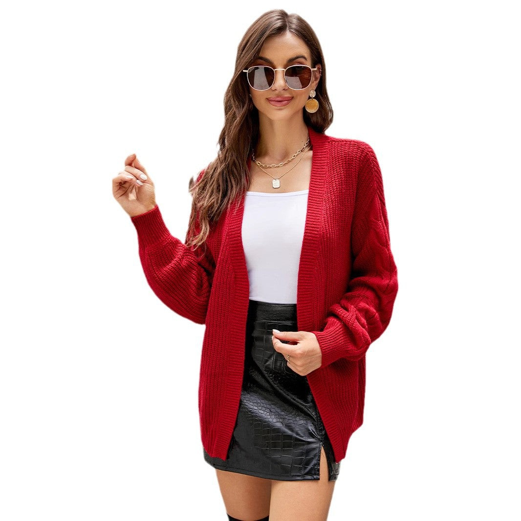 Damen Grobstrickjacke mit voluminösen Ärmeln und modernem Schnitt EB