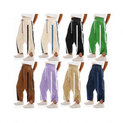 Damen nan relaxte Trackpants mit seitlichem Kontraststreifen, elastischem Smokbund und Eingrifftaschen EB