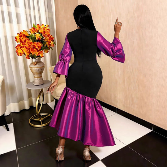 Damen Abendkleid mit voluminösen Ärmeln und elegantem Saum EB