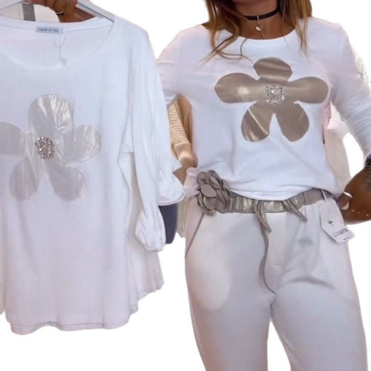 Damen nan locker geschnittenes Langarmshirt mit glänzender Blumenapplikation und Strassmitte EB