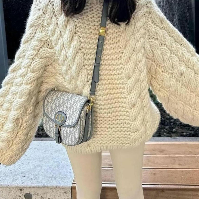 Damen Grobstrickpullover mit oversized Schnitt und kunstvollem Zopfmuster EB