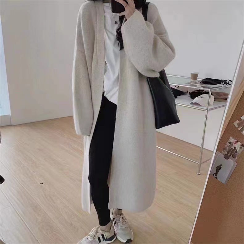 Damen Langer Wollmantel im minimalistischen Stil mit weitem Schnitt und eleganten Details EB