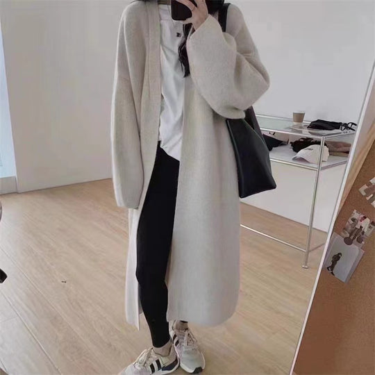 Damen Langer Wollmantel im minimalistischen Stil mit weitem Schnitt und eleganten Details EB