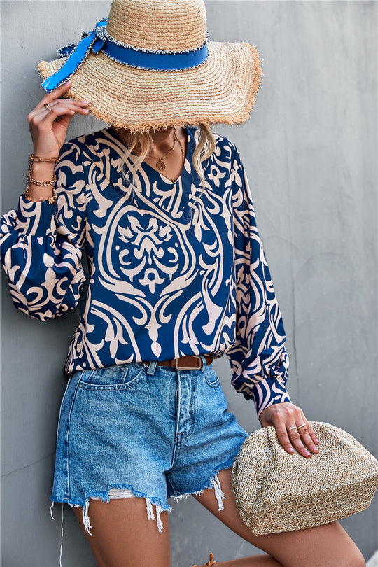 Damen Bluse mit elegantem Barockmuster und lässigen Puffärmeln EB