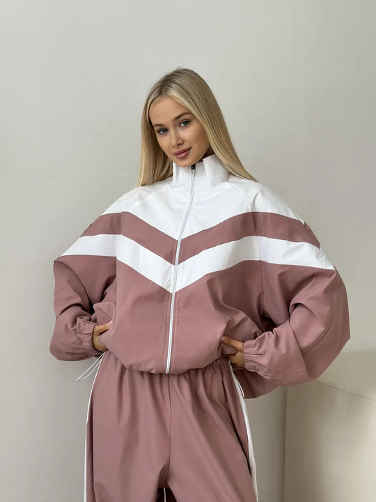 Damen Oversized Windbreaker-Set mit Reißverschlussjacke und elastischer Bundhose Eichborn Berlin