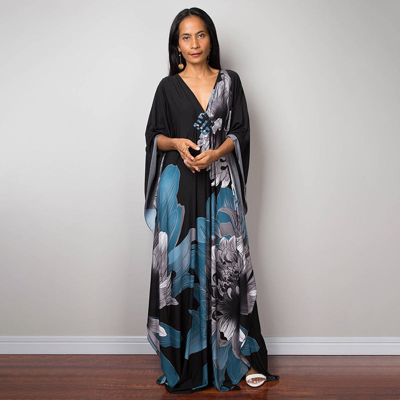 Damen Maxikleid mit kunstvollem Pfauenmuster und seitlichen Schlitzen Heidi Mode