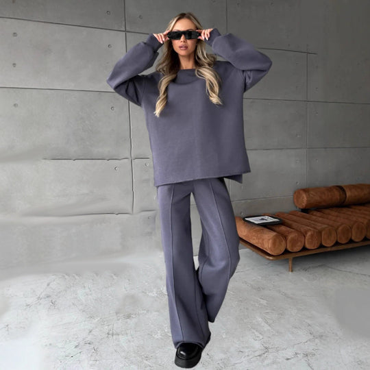 Damen eleganter Lounge-Zweiteiler mit Oversize-Sweatshirt und taillierter Weitbein-Hose Eichborn Berlin