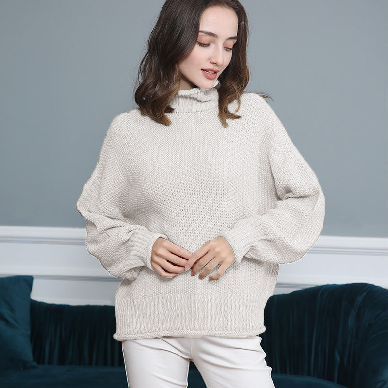Damen Grobstrickpullover mit Rollkragen und luftiger Schnittgestaltung EB