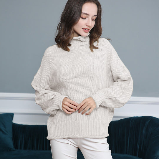 Damen Grobstrickpullover mit Rollkragen und luftiger Schnittgestaltung EB