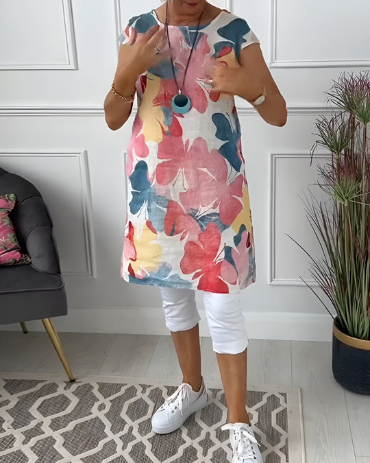 Damen Leichtes Strandkleid mit floralem Muster und Taschen Heidi-Mode