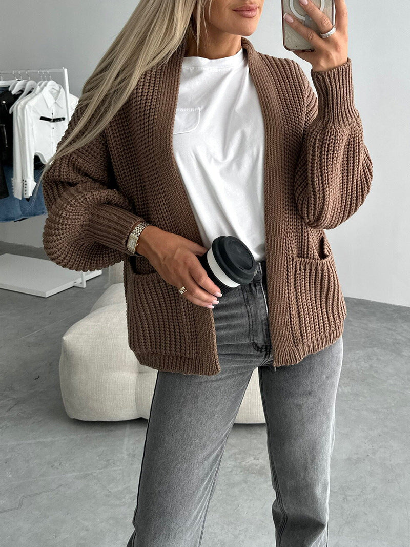 Damen Strickjacke mit strukturierter Oberfläche und voluminösen Ärmeln EB