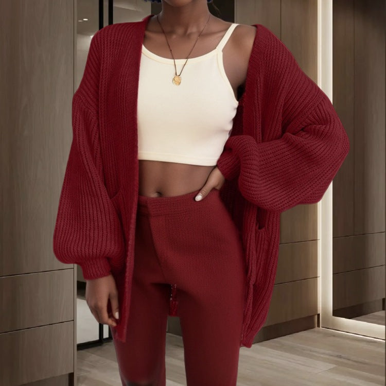 Damen Großer Strickjacke mit voluminösen Ärmeln und praktischen Taschen EB