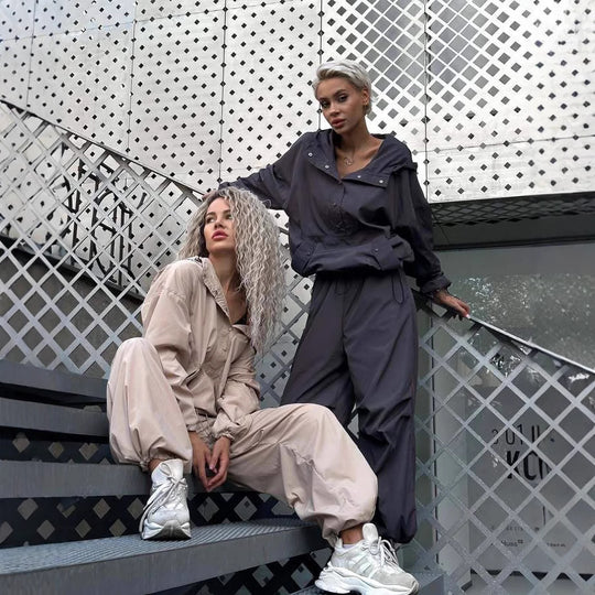 Damen winddichte Technikjacke mit Kapuze und verstellbaren Bündchen EB