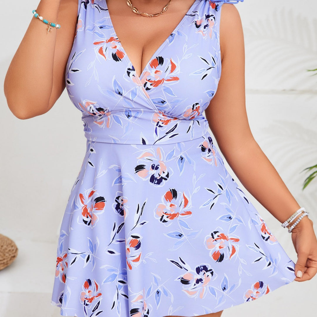 Damen Badeanzug mit floralem Schnitt und praktischen Taschen EB
