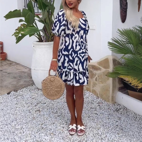 Damen Sommerliches Minikleid mit voluminösen Puffärmeln und trendigem Rüschensaum Heidi-Mode
