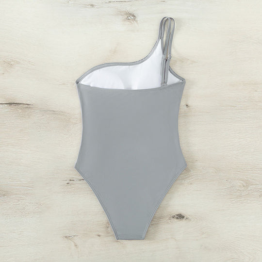 Damen Einteiler Badeanzug mit asymmetrischem Schnitt und modischen Cut-Outs EB