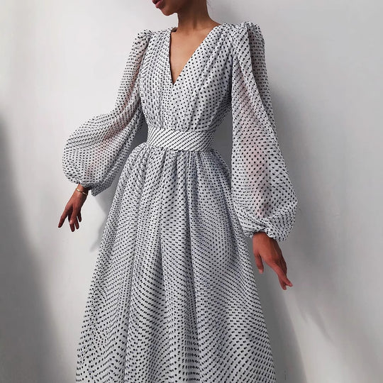 Damen Kleid mit transparentem Puffärmel und floralem Punkte-Design EB
