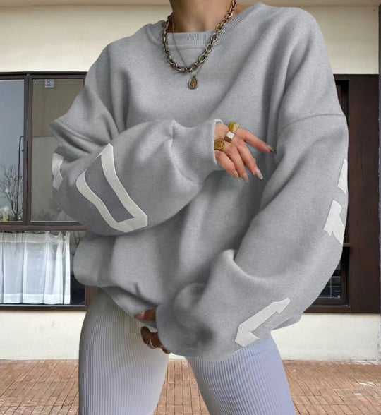 Damen Oversized Sweatshirt mit grafischen Akzenten EB