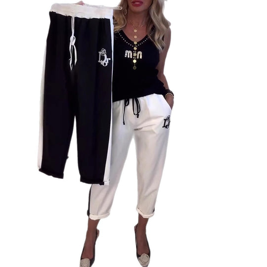 Damen nan Cropped-Jogginghose mit kontrastierendem Bund, seitlichem Zierstreifen, Kordelzug und Logostickerei EB