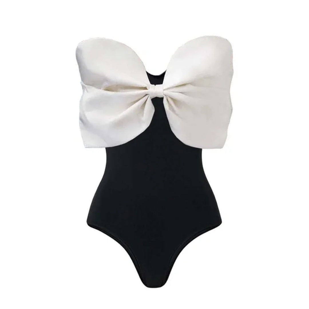 Damen Einschnitt Badeanzug mit voluminösem Schleifen-Detail und elegantem Wickelrock EB