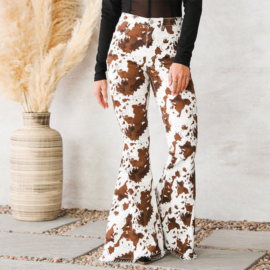 Damen Flared Jeans mit auffälligem Kuhflecken-Muster EB