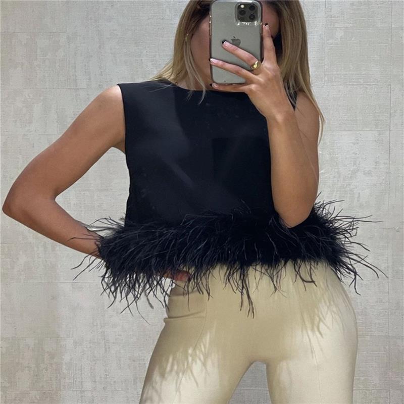 Damen Elegantes Top mit Federn und Rundhalsausschnitt EB