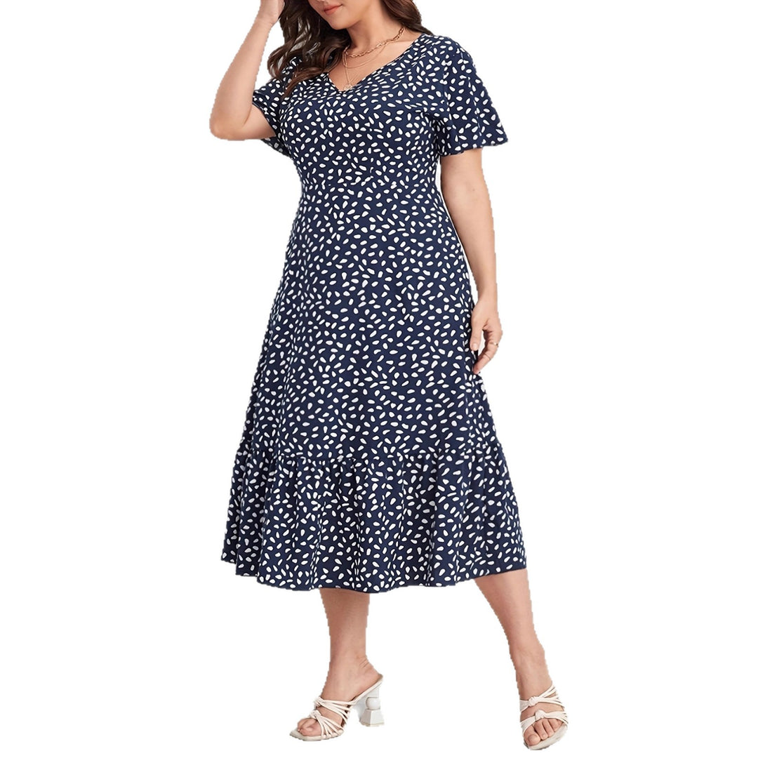Damen Midi-Kleid mit fließendem Schnitt und verspieltem Muster EB