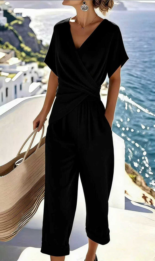 Damen Eleganter Jumpsuit mit Wickeloptik und breiten Beinen EB