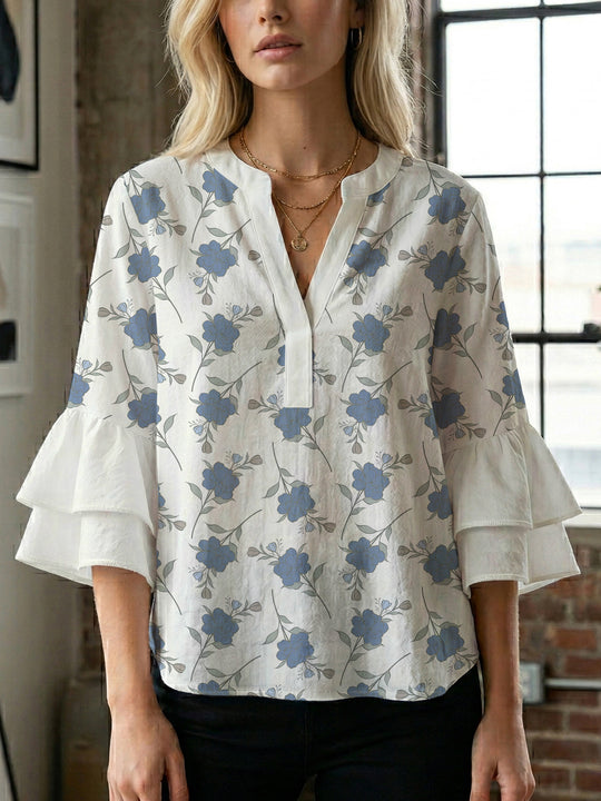 Damen Bluse mit voluminösen Ärmeln und floralem Design EB