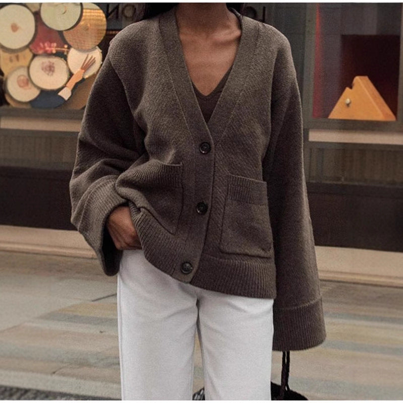 Damen Strickjacke mit voluminösen Ärmeln und praktischen Taschen EB
