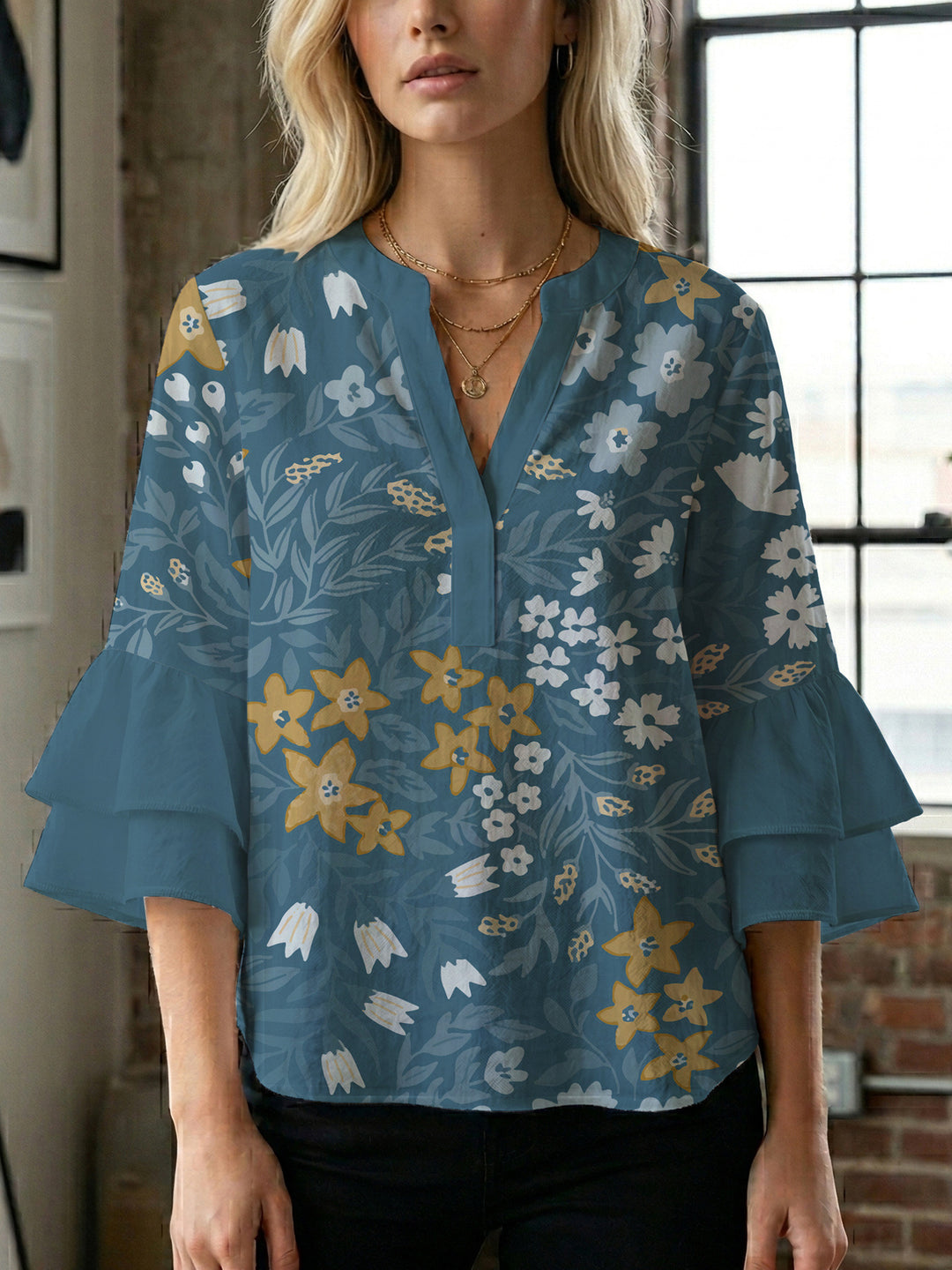 Damen Bluse mit voluminösen Ärmeln und floralem Design EB