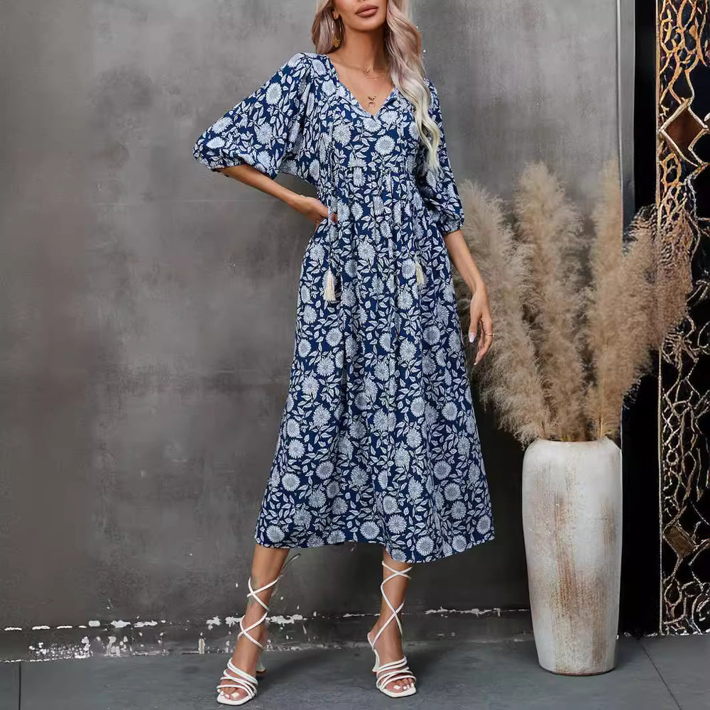 Damen Maxikleid mit grafischem Blumendesign und schwingendem Saum EB