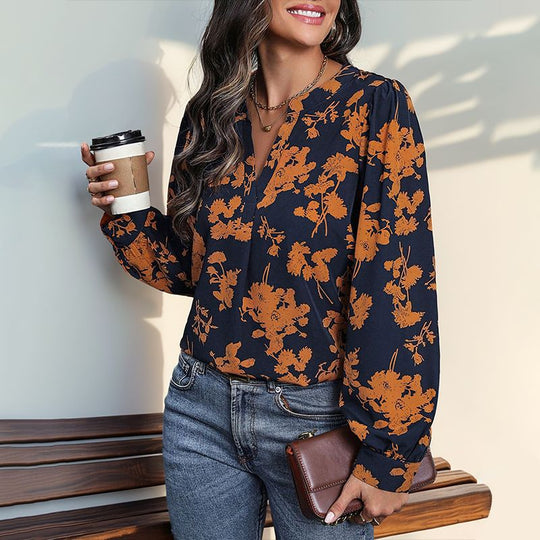 Damen Bluse mit floralem Muster und eleganten Puffärmeln EB