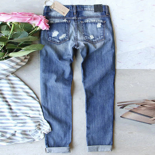Damen Jeanshose mit fröhlichen Kleeblatt-Prints und modischen Destroyed-Details EB