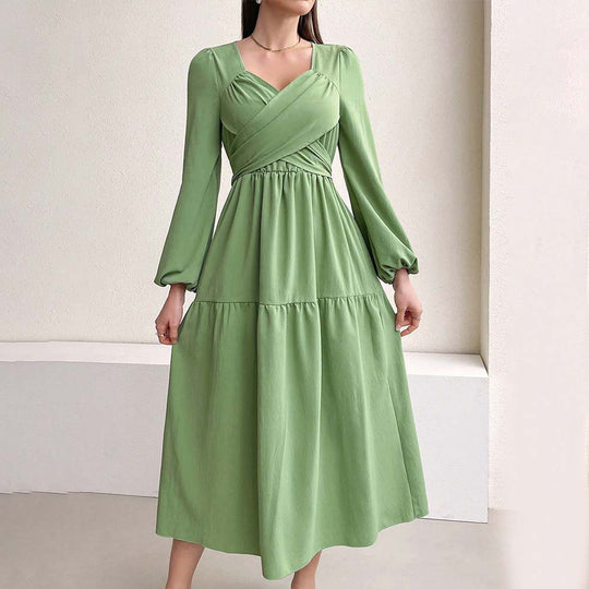 Damen langärmeliges Midikleid mit überkreuztem Drapé-Bustier, elastischer Unterbrustnaht und zweistufigem Stufenrock Eichborn Berlin