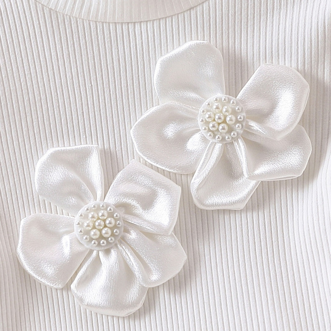 Mädchen modische Bluse mit transparenten Puffärmeln und floralen Akzenten EB