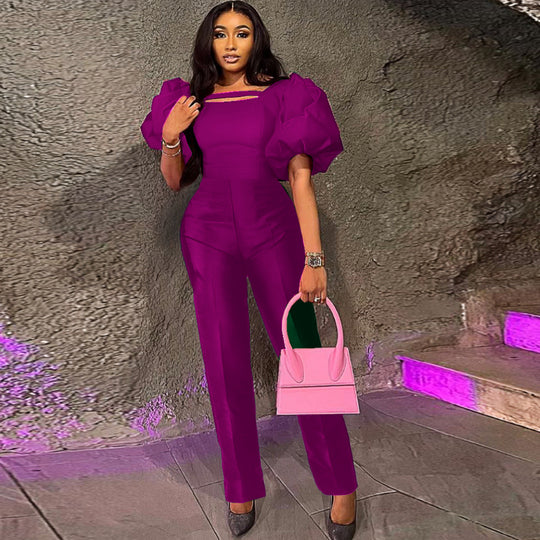 Damen Jumpsuit mit voluminösen Puffärmeln und tailliertem Design EB