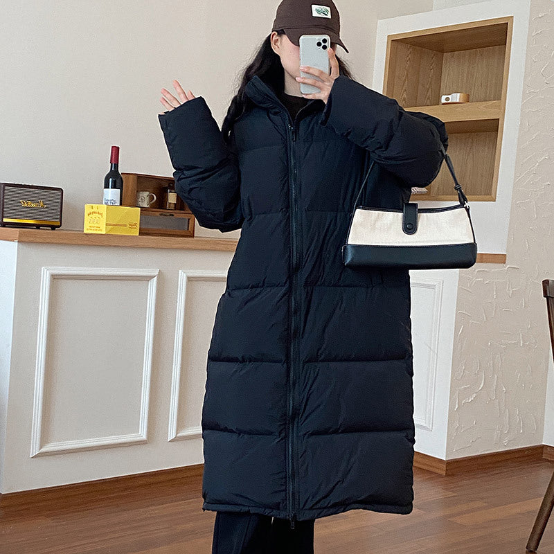 Damen Lange Pufferjacke mit Kapuze und voluminösem Schnitt EB