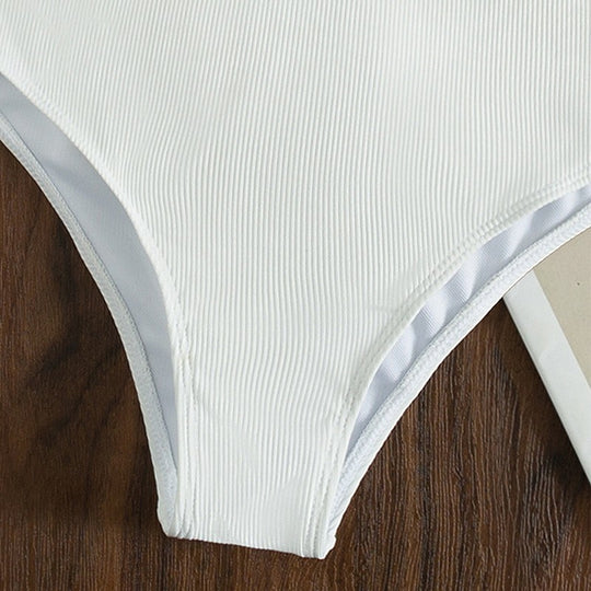 Damen Einteiler Badeanzug mit tiefem V-Ausschnitt und feiner Rippstruktur EB