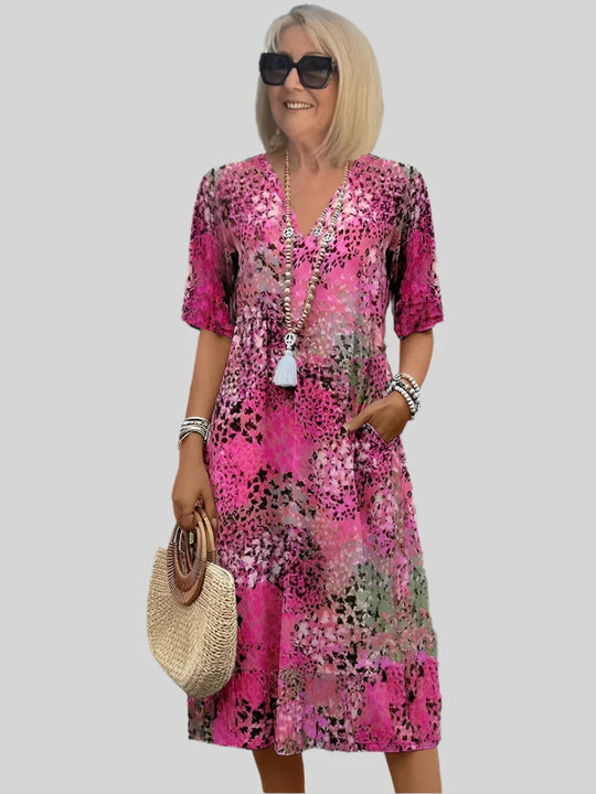 Damen Sommerliches Maxikleid mit floralem Design und praktischen Taschen EB