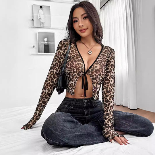 Damen Transparente Langarmbluse mit Leopardenmuster und Scherpenkante EB
