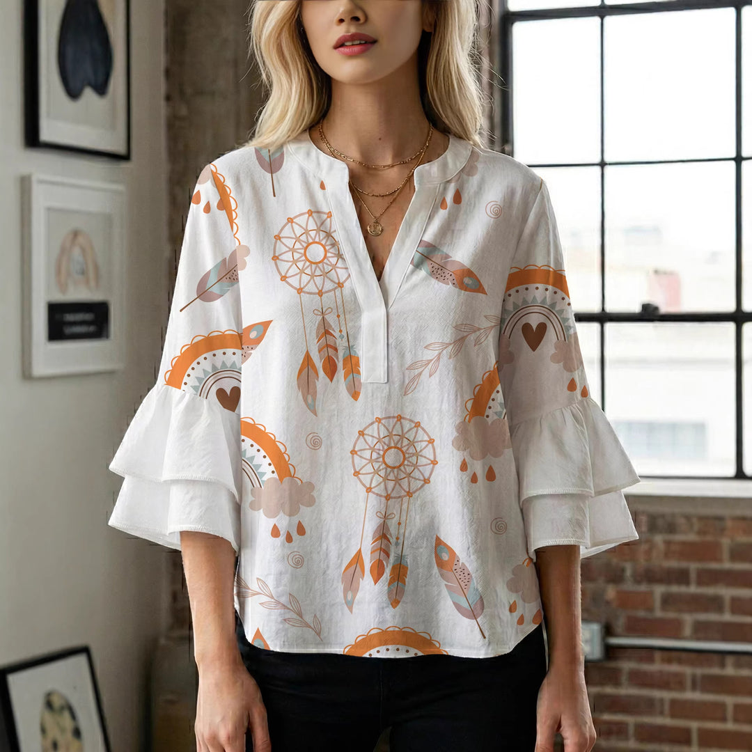 Damen Bluse mit voluminösen Flügelärmel und intensivem Blattmuster EB