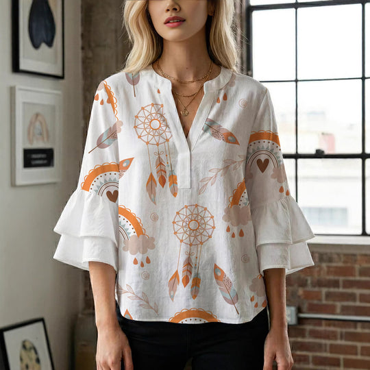 Damen Bluse mit voluminösen Flügelärmel und intensivem Blattmuster EB