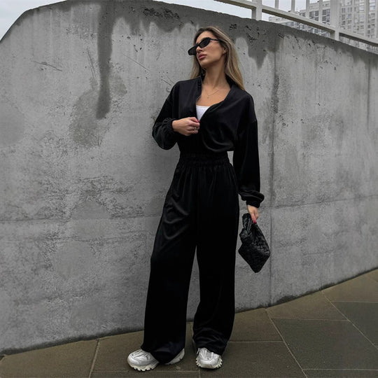 Damen Samt-Jumpsuit mit weitem Bein, elastischer Taillenpartie und Stehkragen EB